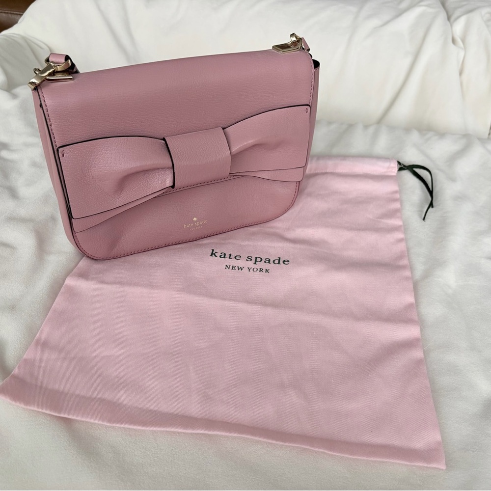 Kate Spade New York Pink Bow Crossbody Bag
Burgundy Interior